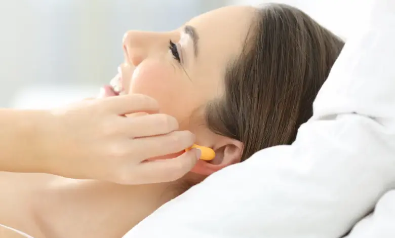 Lady Going To Sleep With Earplugs