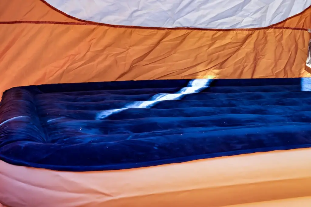 Inflatable Air Mattress on the Floor of a Tent 