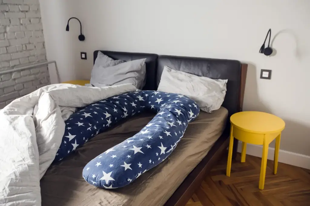 U-shaped Body Pillow on the Bed 