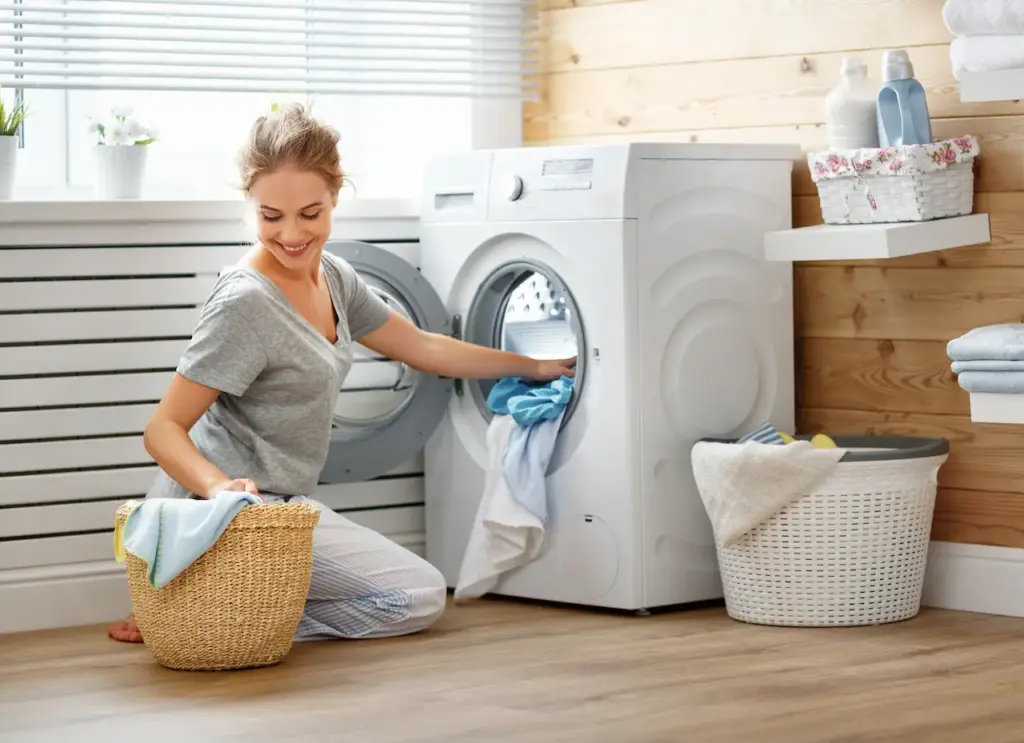 Woman Washes Clothes And Bed Sheets, What Is The Best Way To Wash Your Sheets?