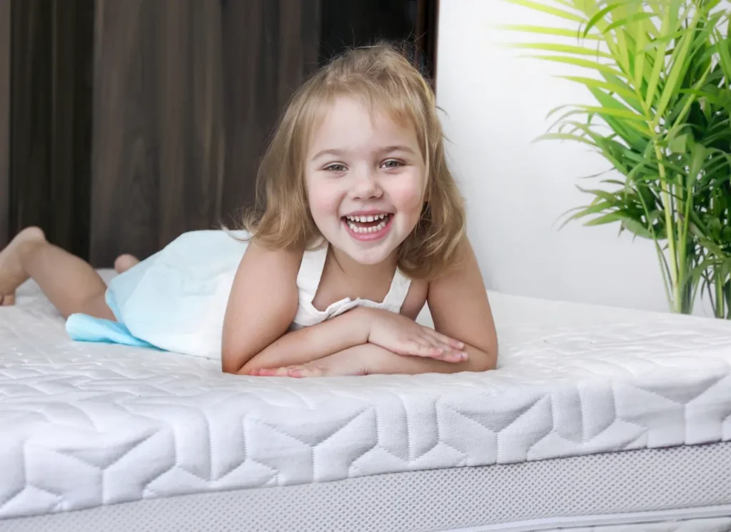 Kids Laying in Mattress 