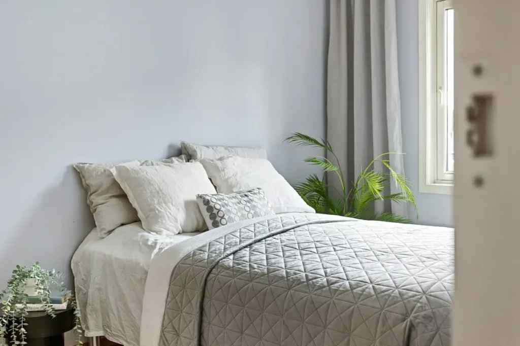 A Close Up Image of a Bed in the Bedroom