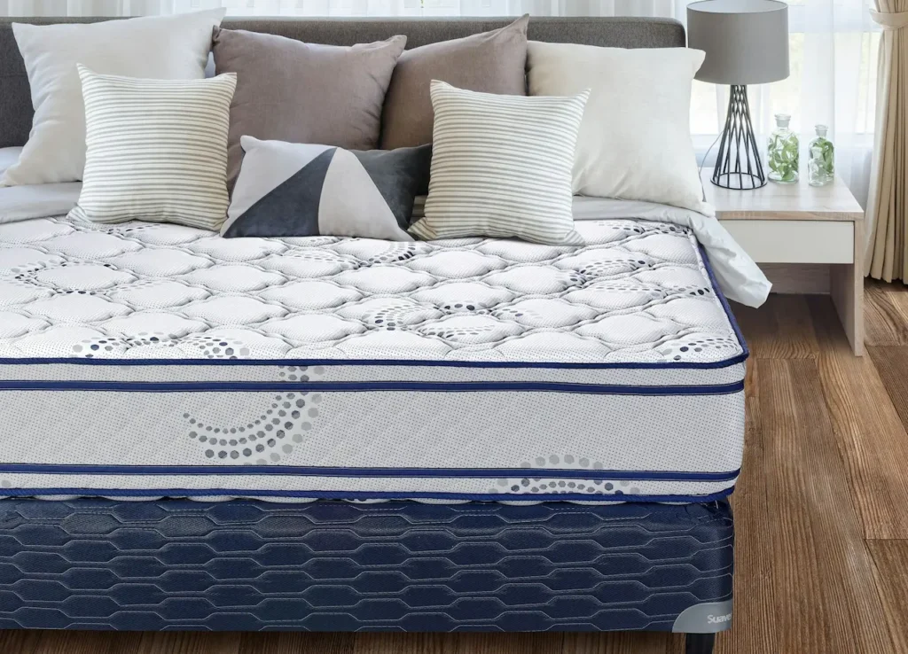 A Patterned Mattress with Pillows 