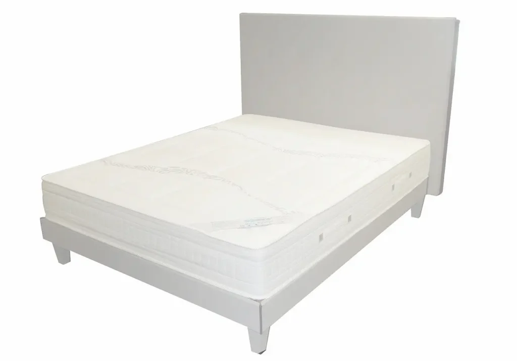 A White Air Mattress Placed on a Bed