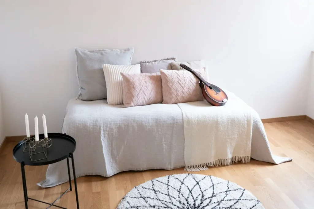 White and Brown Throw Pillows on a Couch